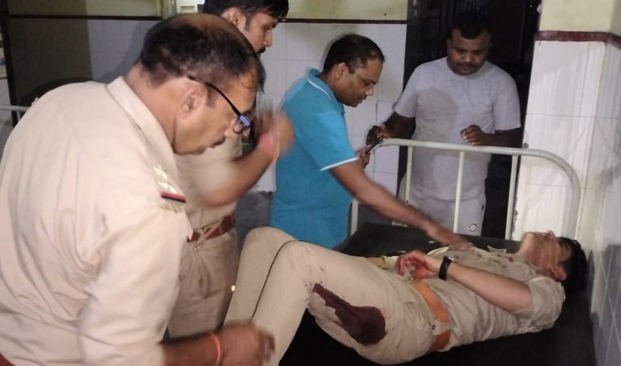 The policeman was chased and beaten, then stabbed and left bleeding.