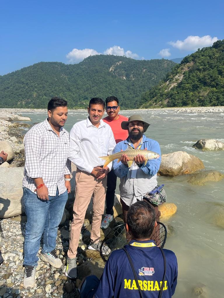 Angler caught golden mahseer weighing three and a half kilos on the first day