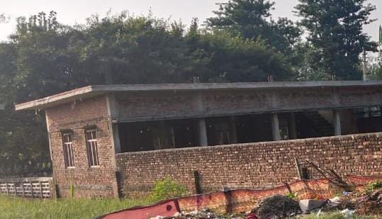 Construction of disputed building stopped, order to demolish wall