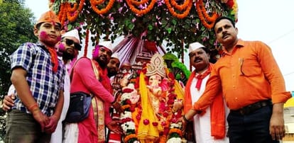 Ganpati was immersed in a procession at Garra Ghat.