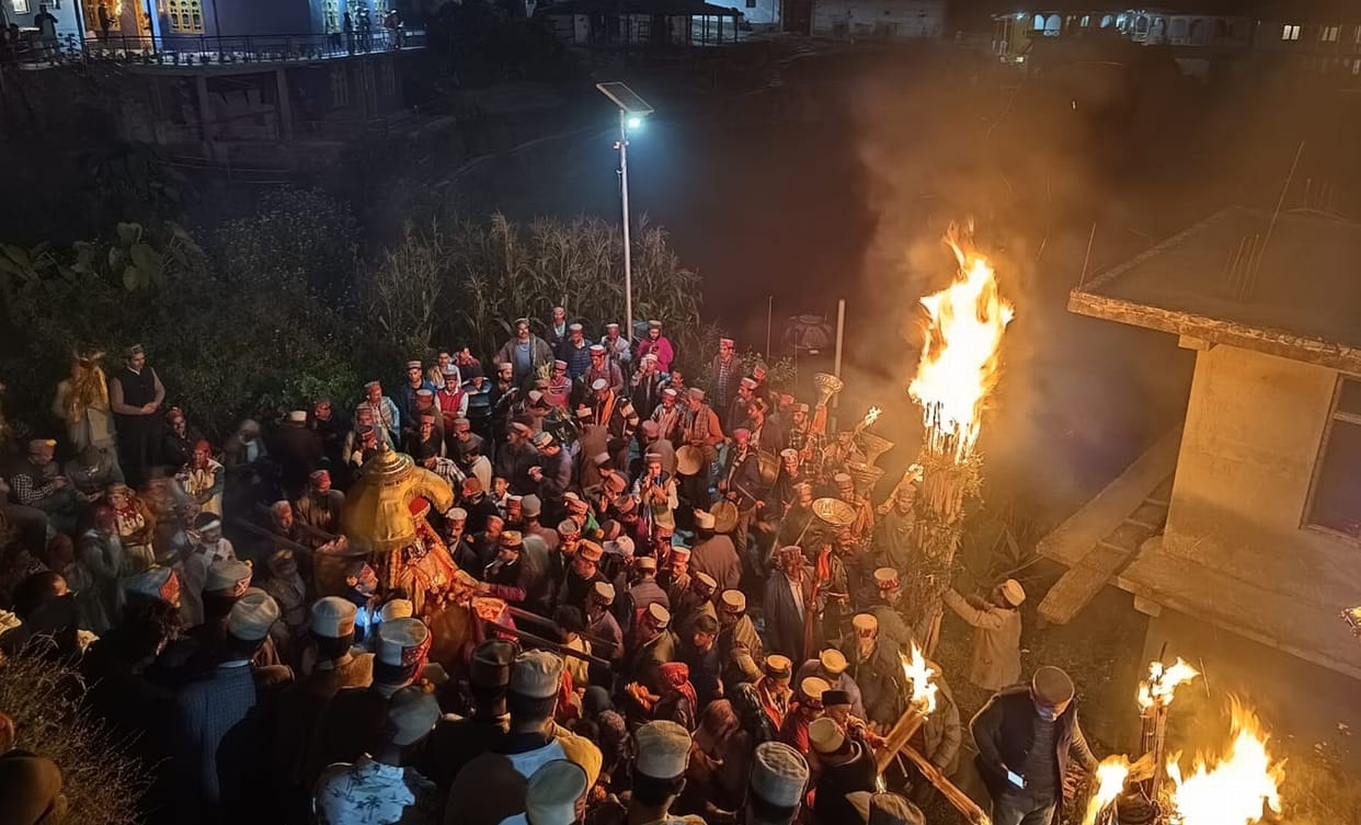 A game of tricks on embers for happiness and prosperity