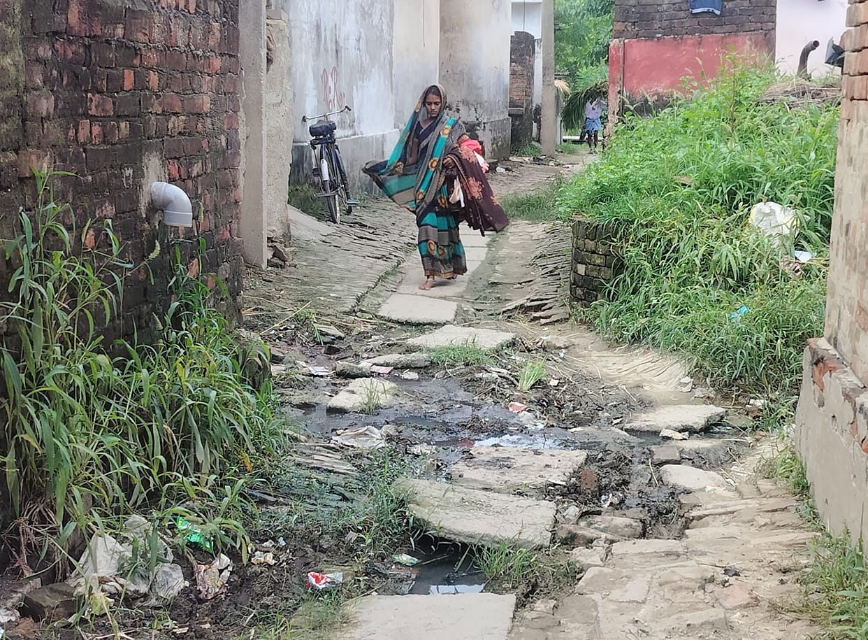 Broken road and blocked drains