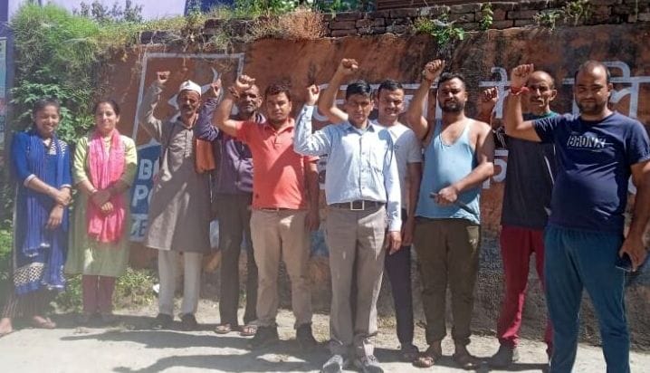 Demonstration of villagers enraged by poor asphalting