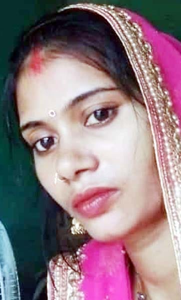 Woman's body found hanging, accused of murder