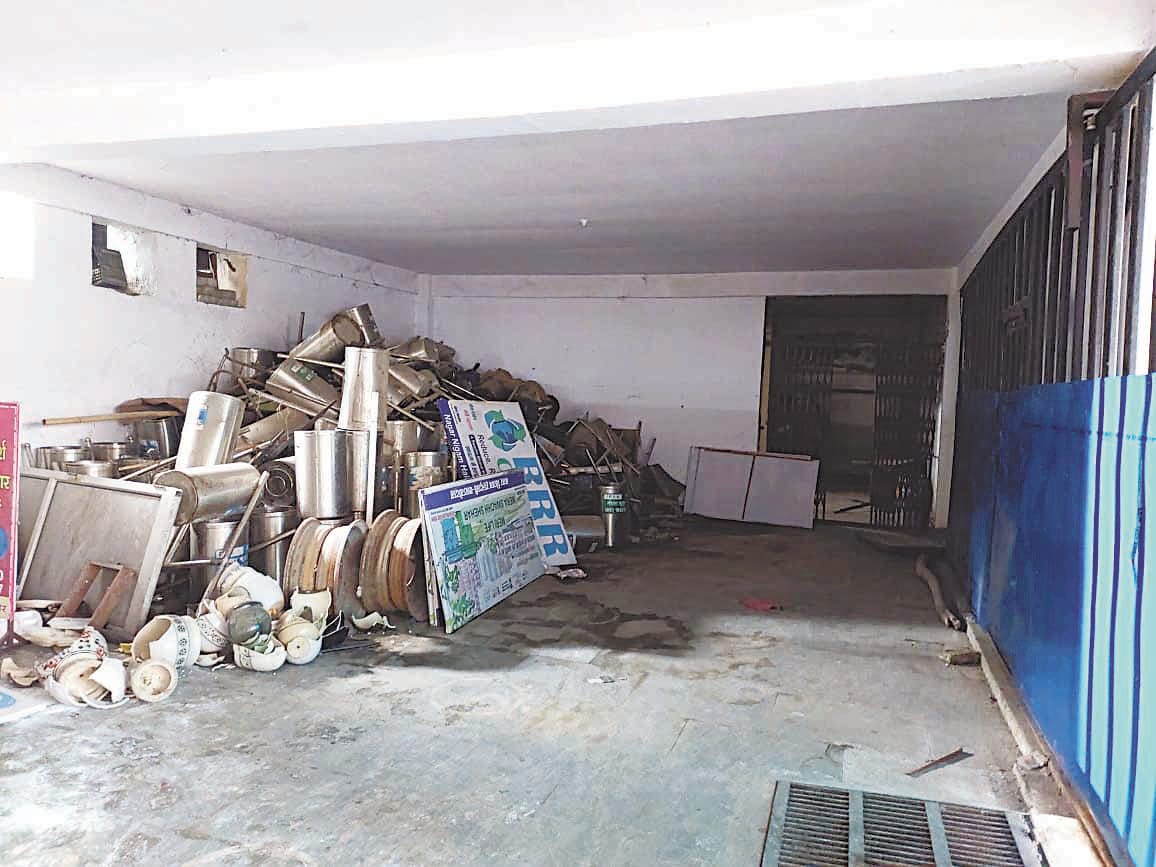 Parking lot is converted into office, vehicles are parked on the road