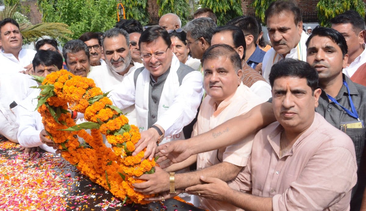 Will give reservation in jobs to the families of the agitators: Dhami