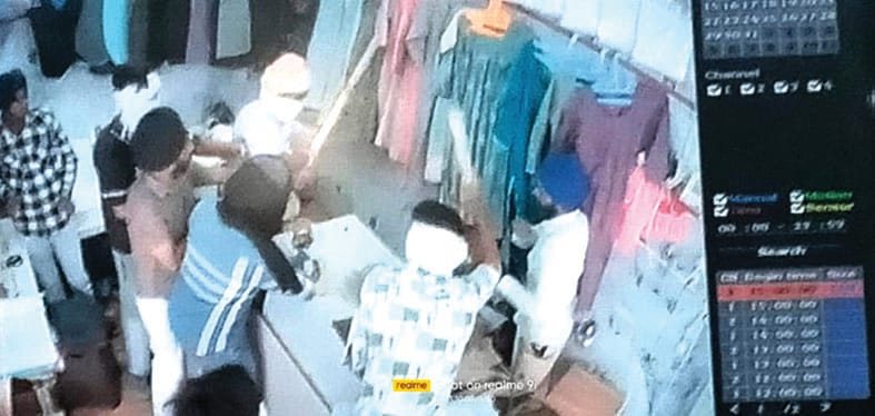 Masked miscreants entered the shop and attacked the young man, injured