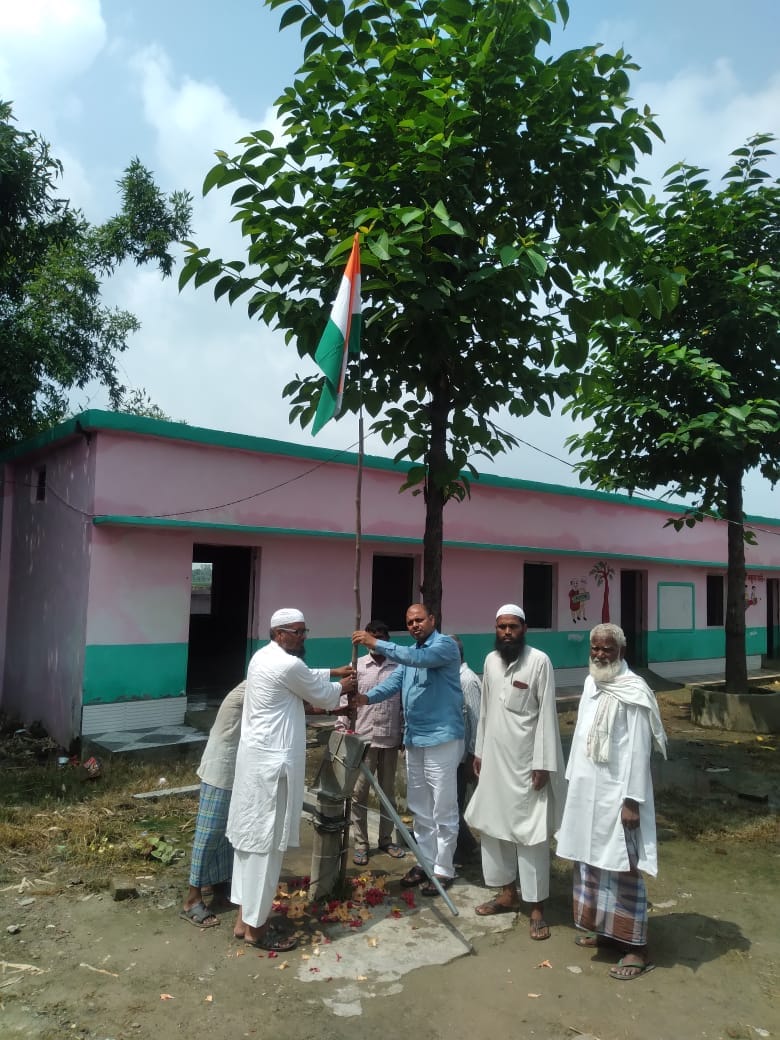 Headmaster hoisted flag by tying it to government hand pump, suspended