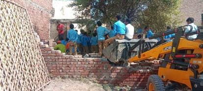 Students protested after breaking the wall of the stand