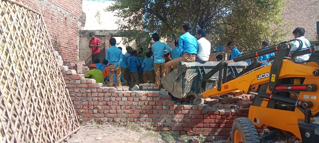 Students protested after breaking the wall of the stand