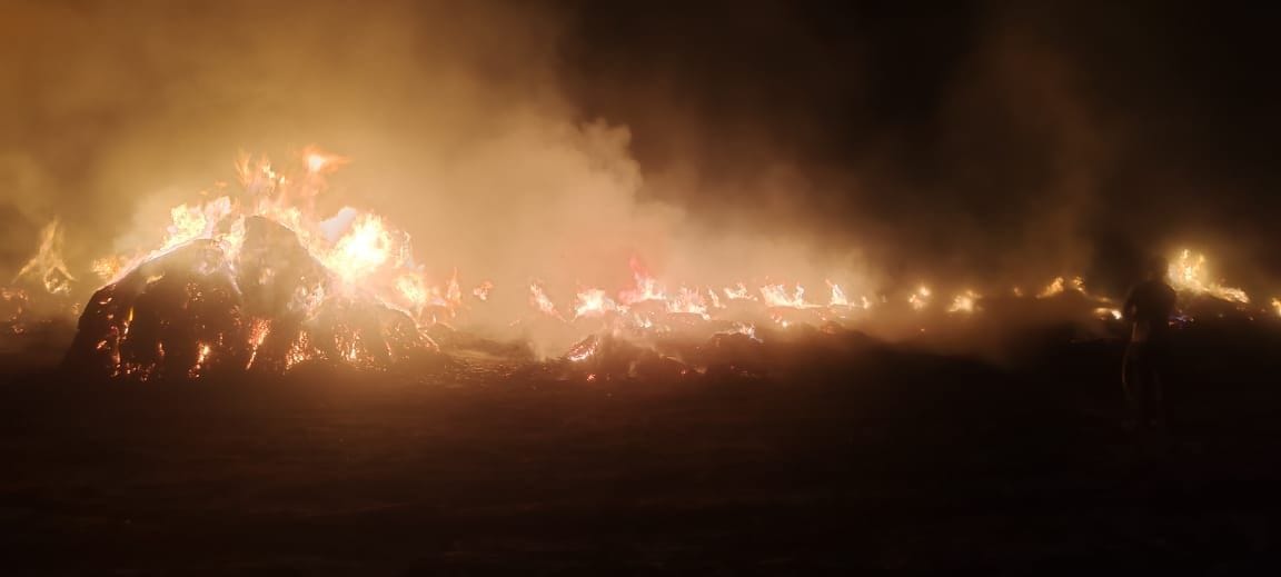 Fire broke out in thousands of tonnes of millet sheaves kept in one and a half acre area.