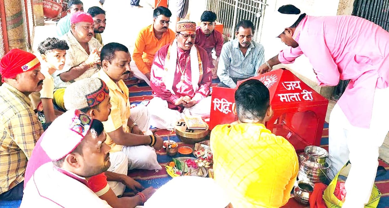 Devotees set out to collect the nectar pot and sacred flame.