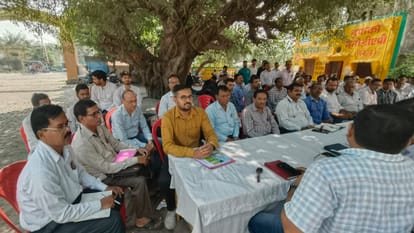 Employees given training on harvesting sugarcane crop