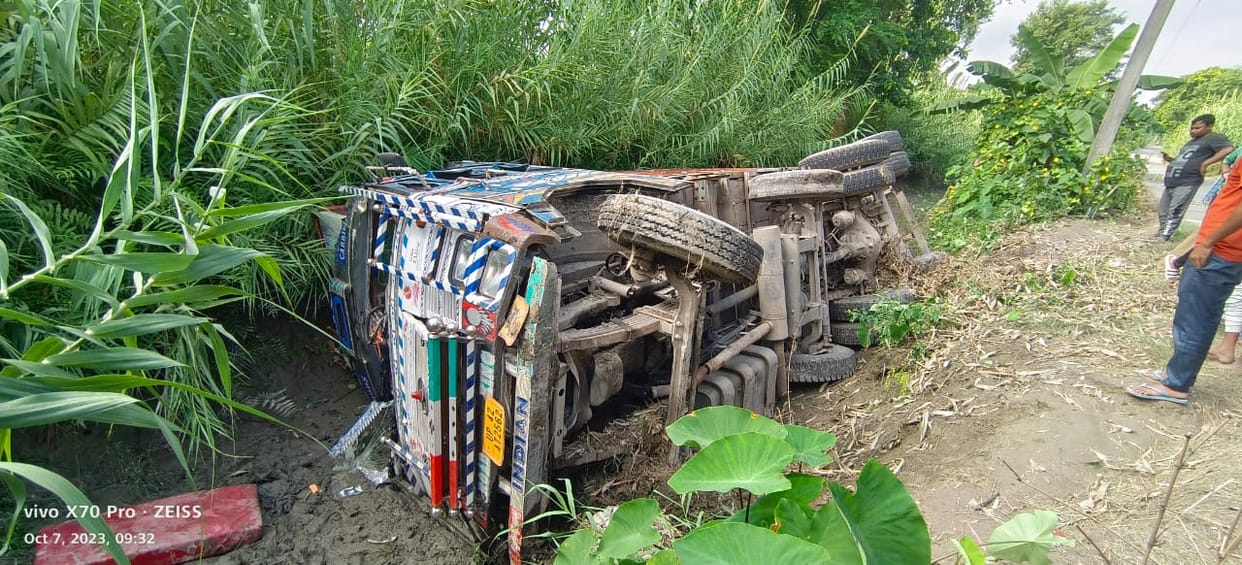 Ration laden truck went out of control and overturned in the canal