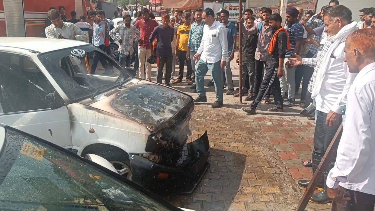 Fire broke out in a car parked outside the old bus stand, created panic