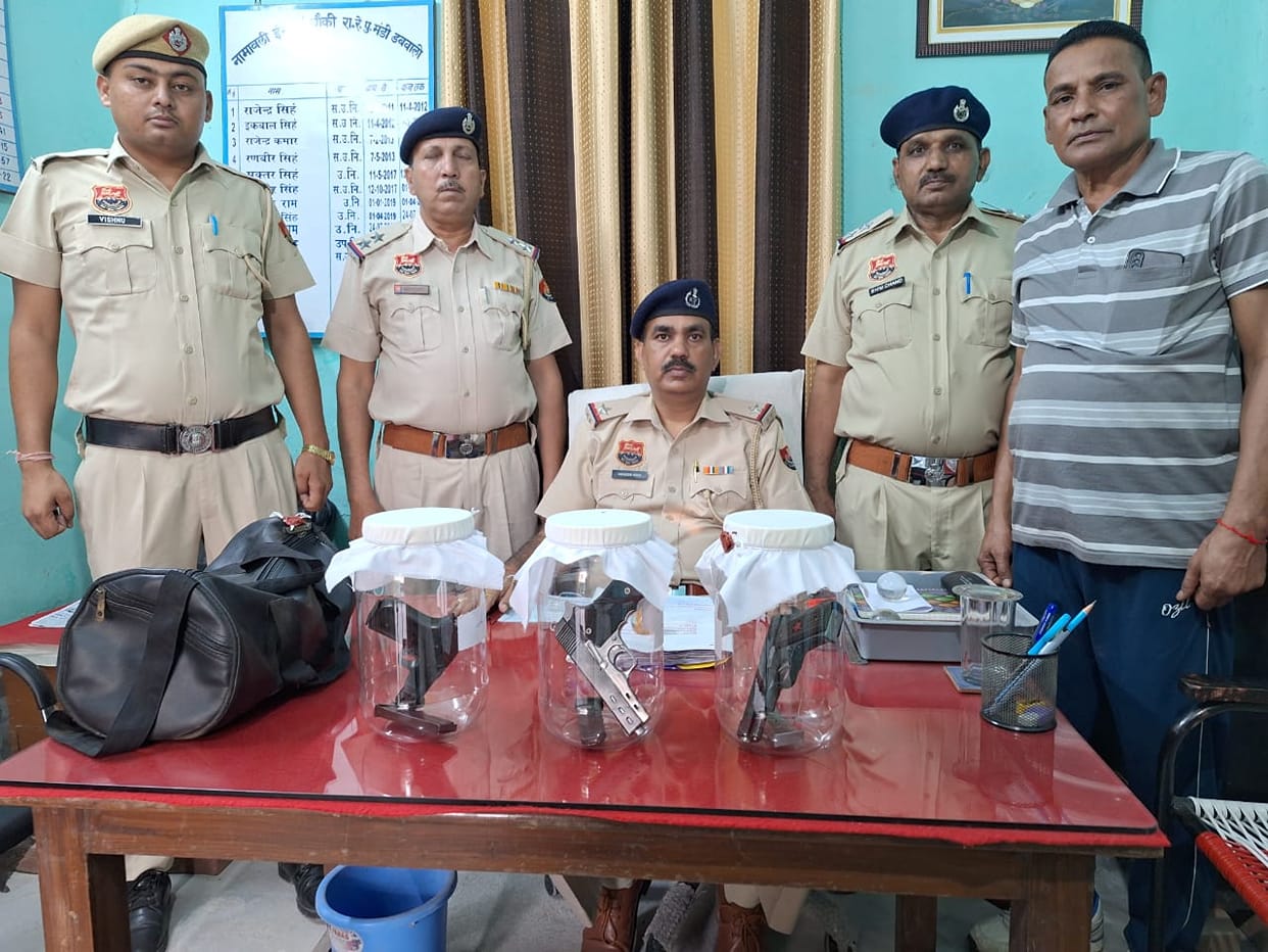 Three semi automatic guns and 6 magazines found in white clothes from Ahmedabad Jammu Tawi train