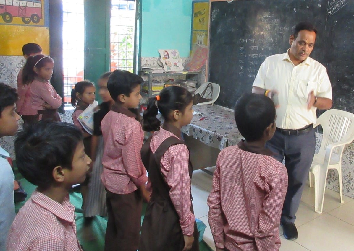 Children read out poems and books to DM