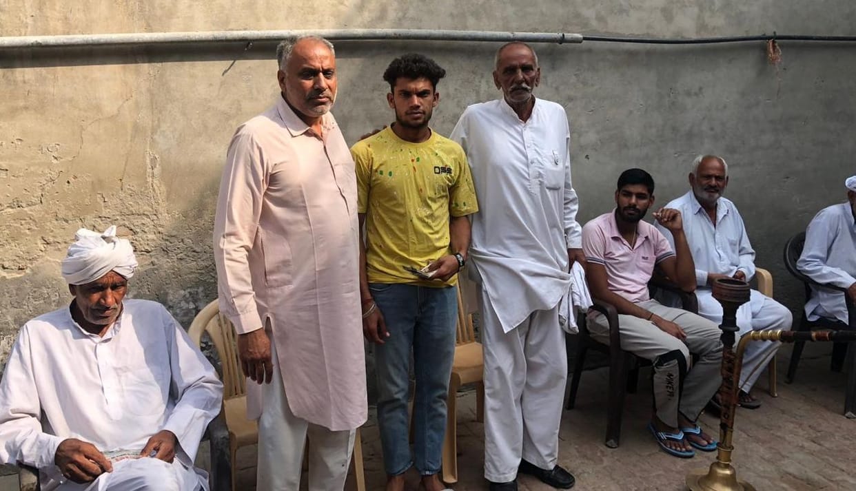 Satish, who brought 50 kg sugar bag on his shoulder from village Bithamra, honored