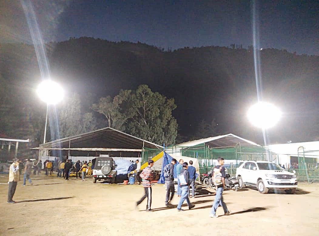 Sports field illuminated with high mast lights