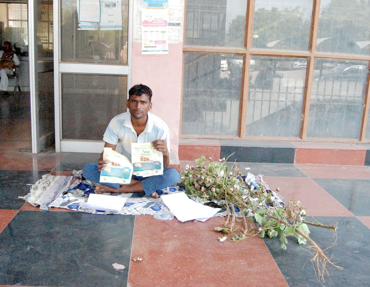 Farmer sitting on strike under the agriculture department office alleging bad seeds