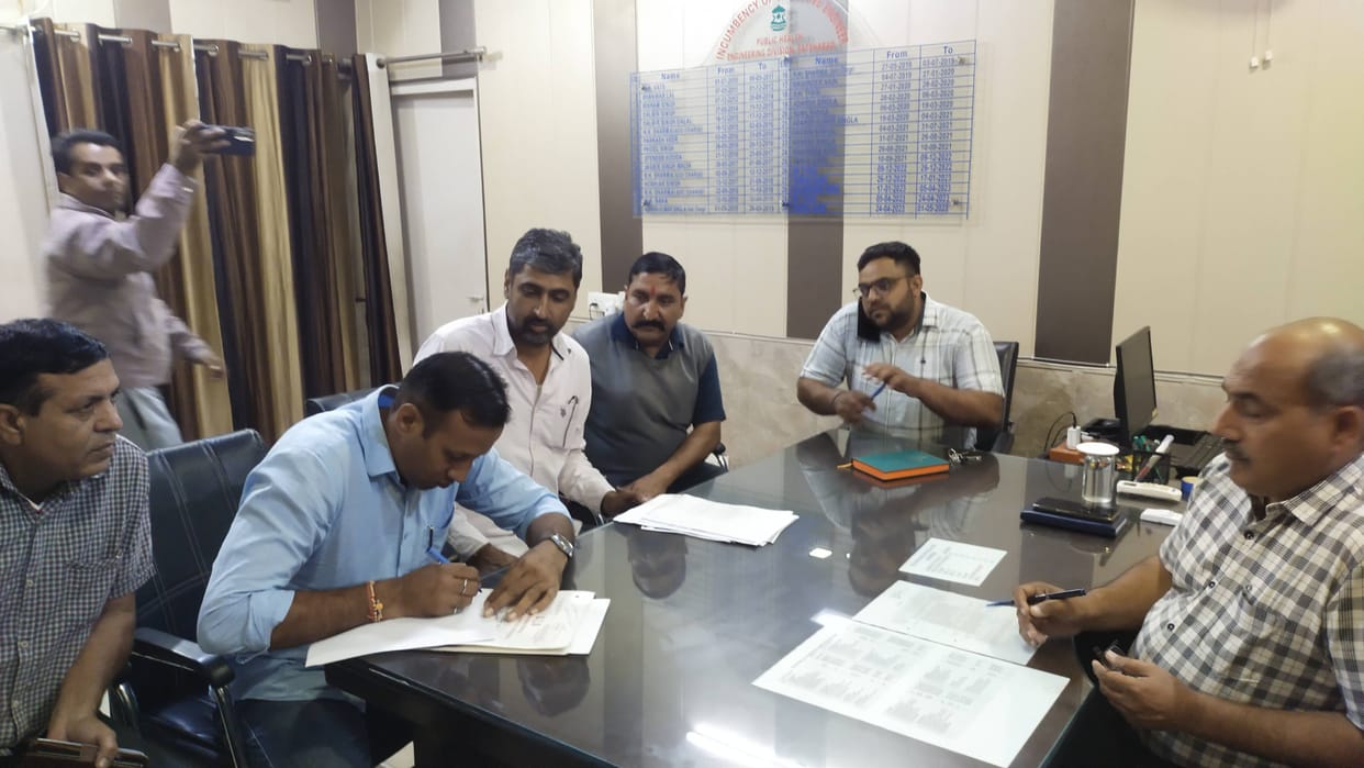 Six employees found absent from duty, records of 210 works seized
