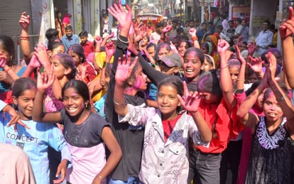 A lot of gulal was blown during the immersion procession of Maa Durga.