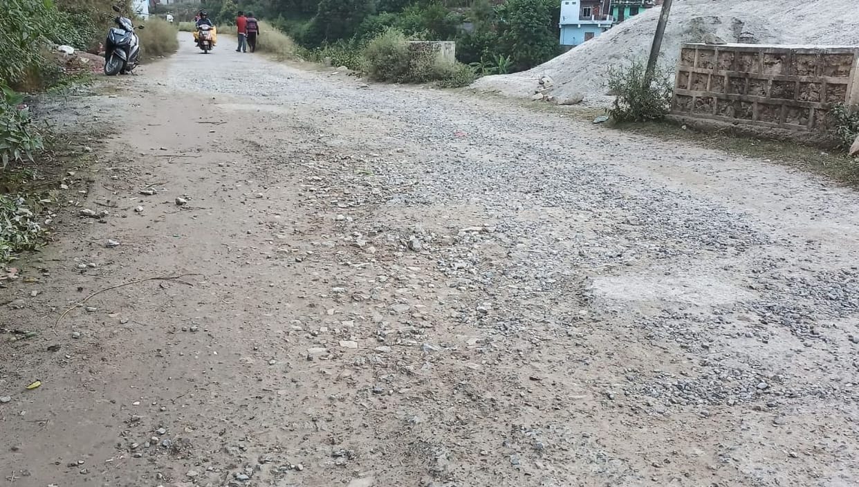 Big potholes on the road are causing pain