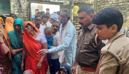 Woman's body found hanging, accused of murder