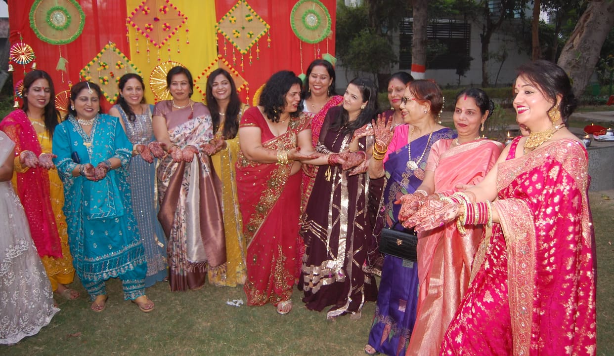 The married women offered Arghya and saw the moon through a sieve.
