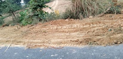 Instead of repairing the road, it was filled with soil