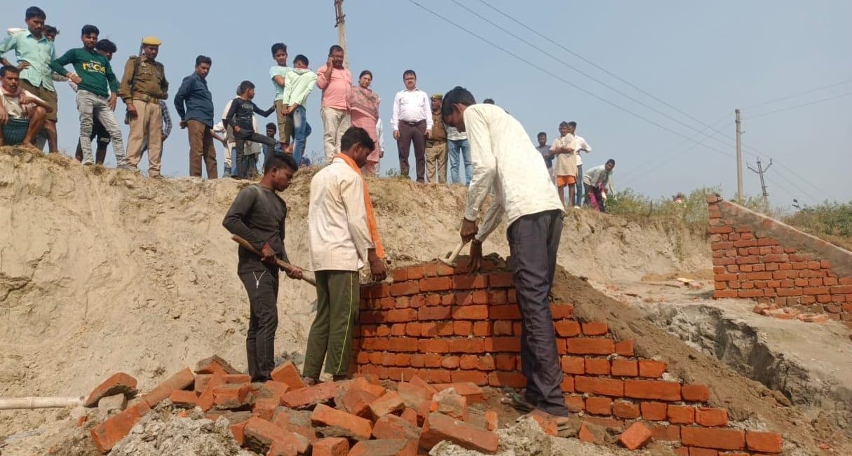 Use of double brick in construction for pitching boulders.