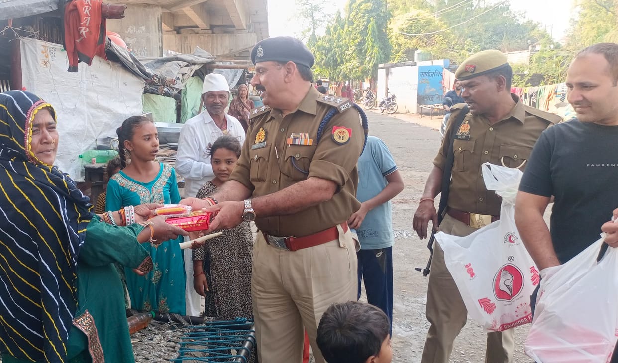 Police officers arrive at the doorstep of the needy with sweets and crackers