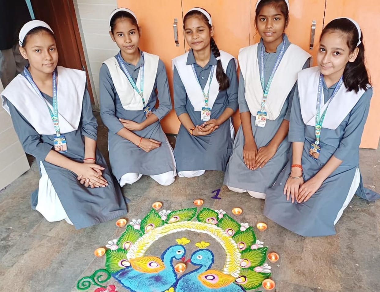 Girl students won prizes by decorating attractive rangoli tablets
