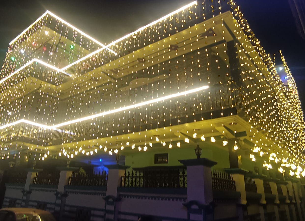 The city was bathed in lights, the market was buzzing