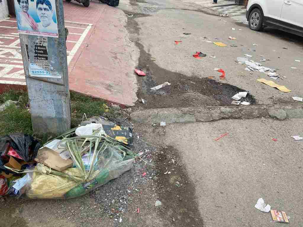 If Diwali tip is not given then the sanitation workers throw garbage in front of the houses
