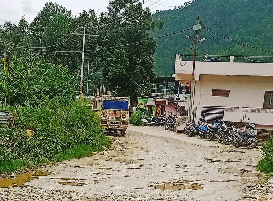 Roads in the district turned into potholes, making it difficult for people to walk.