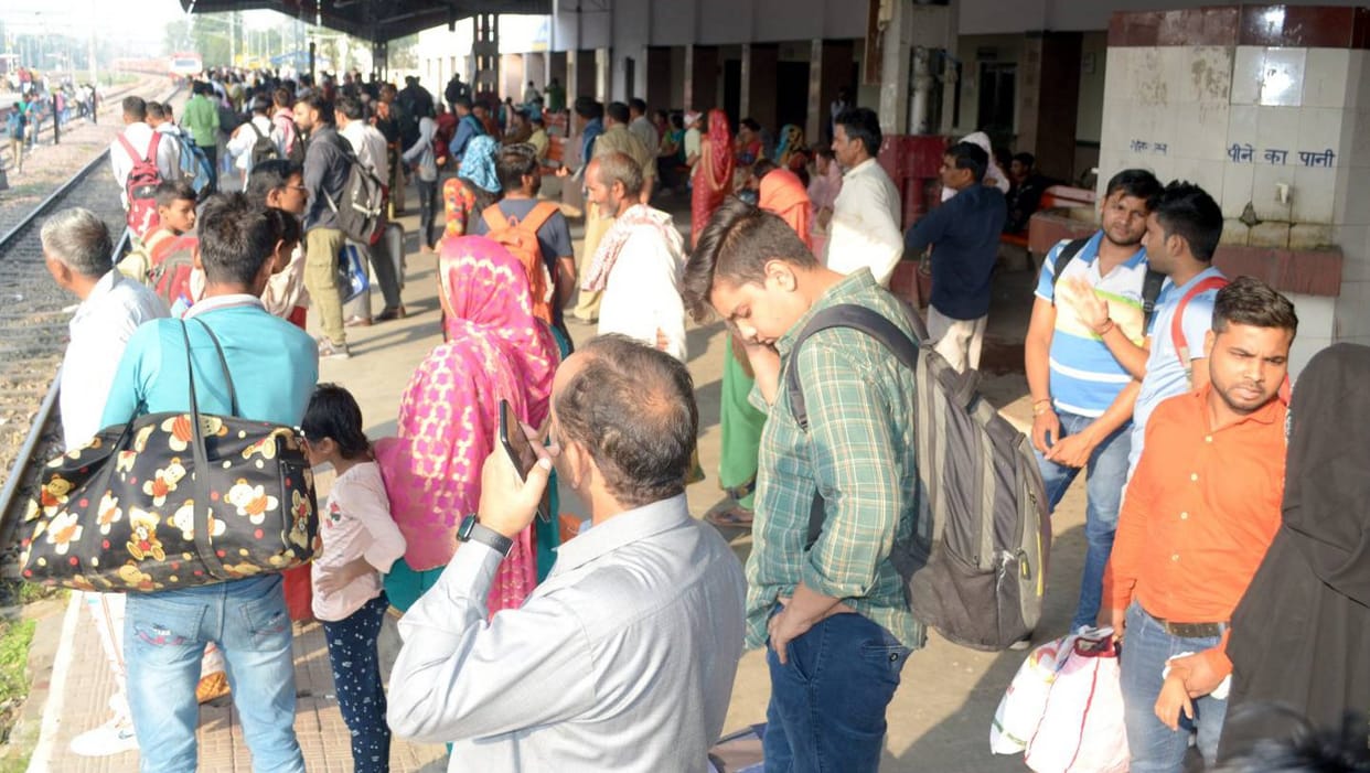 Crowd of passengers in trains and buses