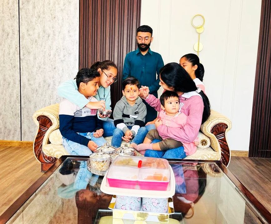 Sisters put tilak on brother's forehead

wishing for a long life
