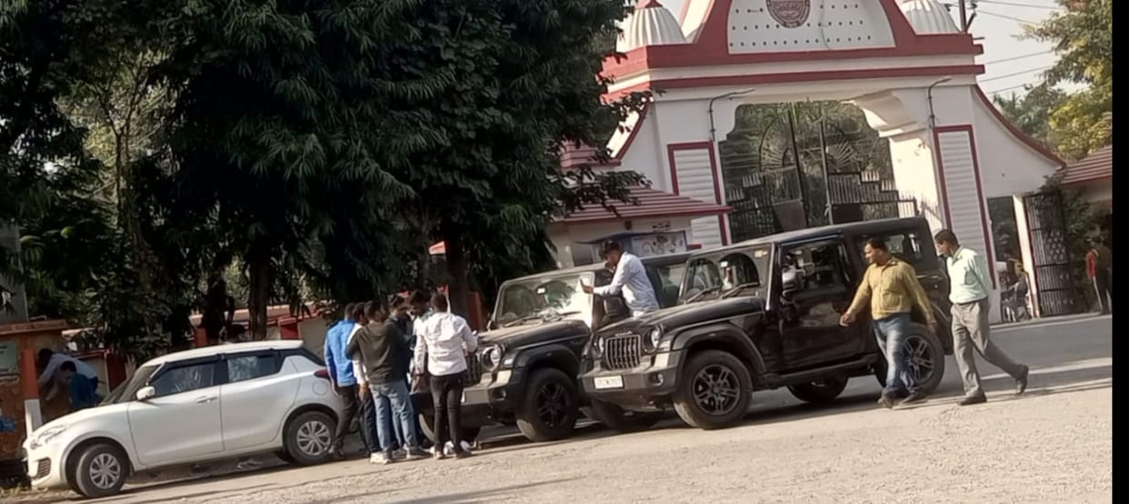 Luxury vehicles parked in a queue at the main gate of the university were cut off.