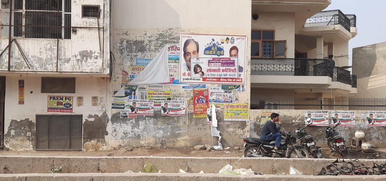 City covered with illegal hoardings and banners
