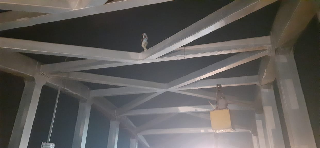 Young man climbed over railway overbridge, came down after an hour
