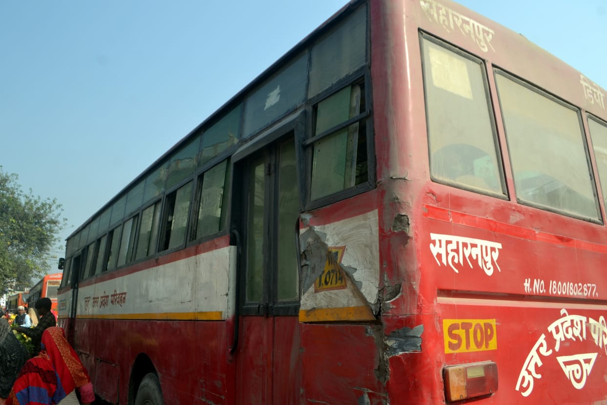 Traveling in a dilapidated and broken glass bus