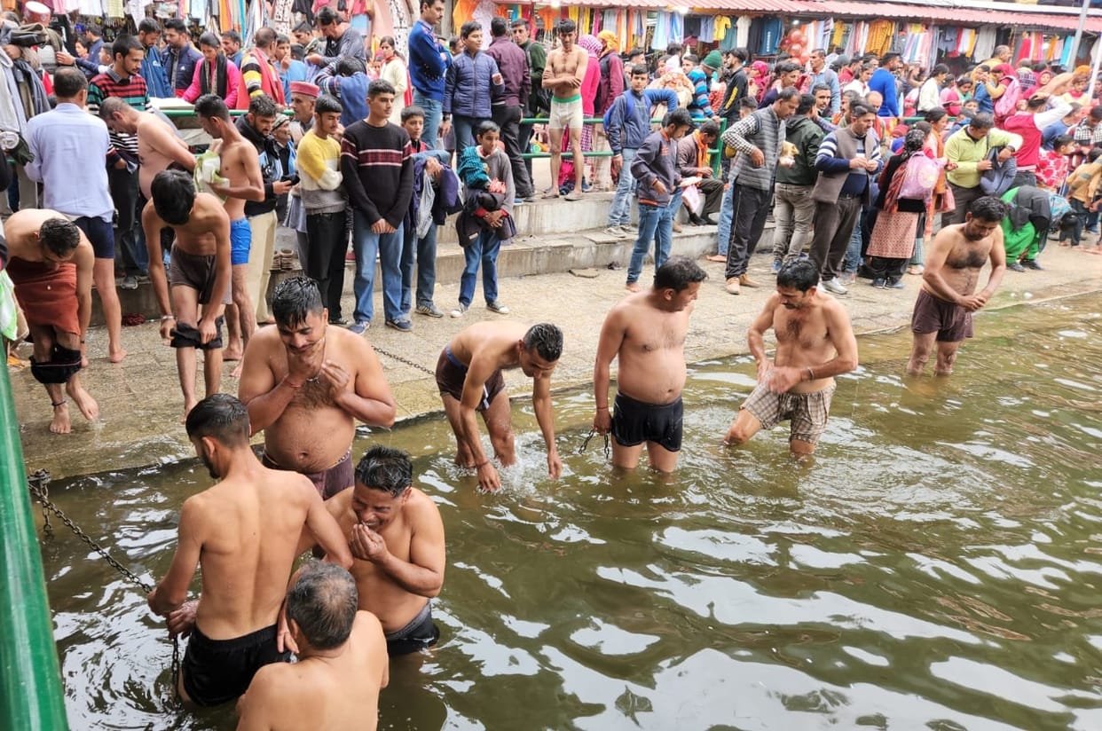 people worship and bath in renuka lake on kartik purnima