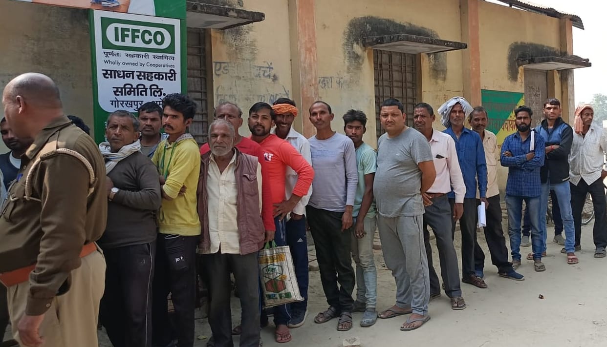 Fertilizer distributed amid police protection
