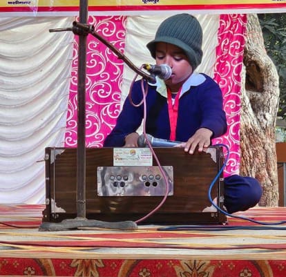 Children gathered by singing patriotic songs
