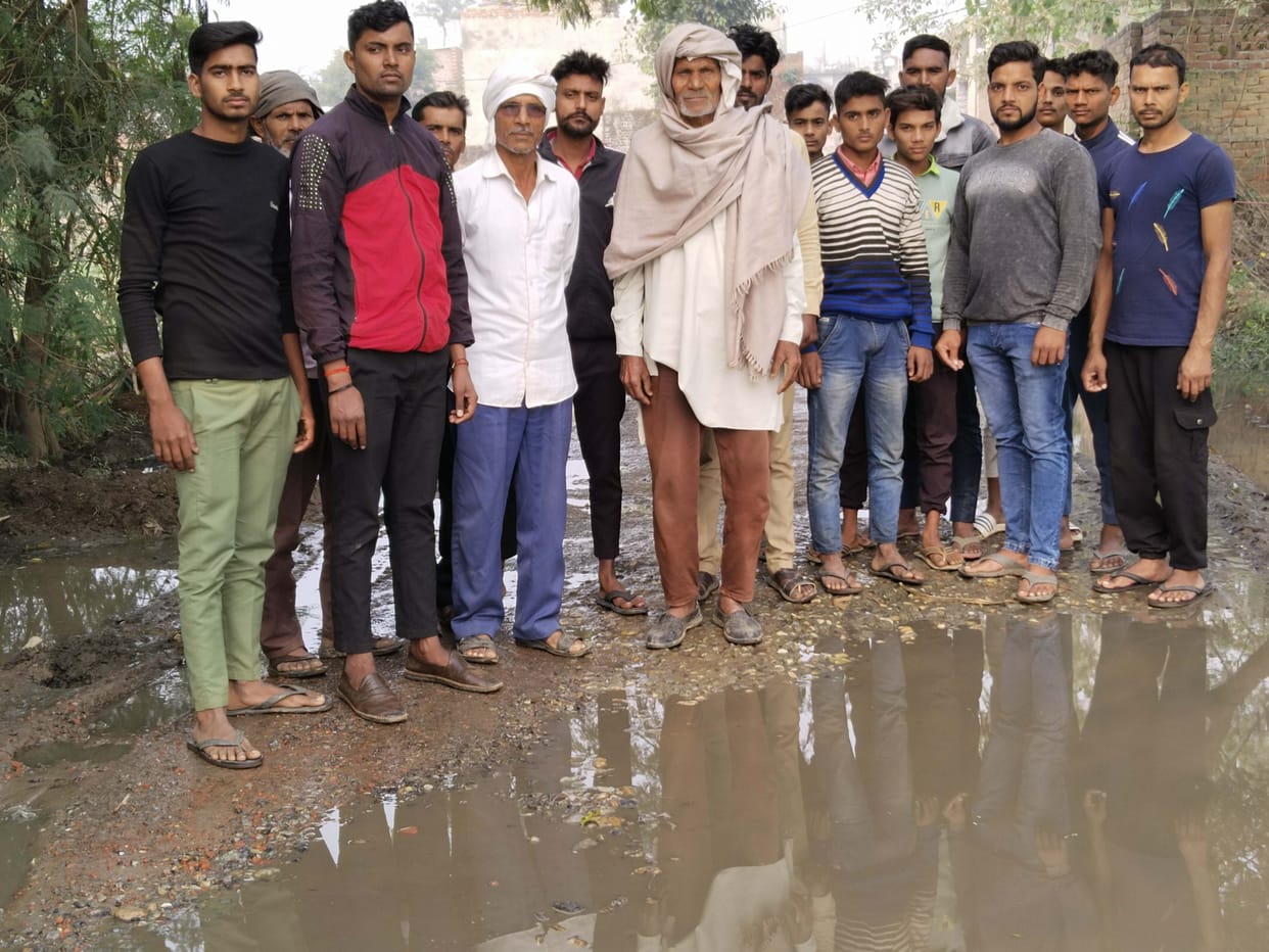 Villagers demonstrated against waterlogging on the road