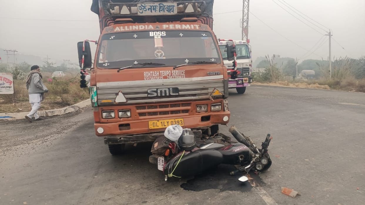 Canter hits bike, driver injured