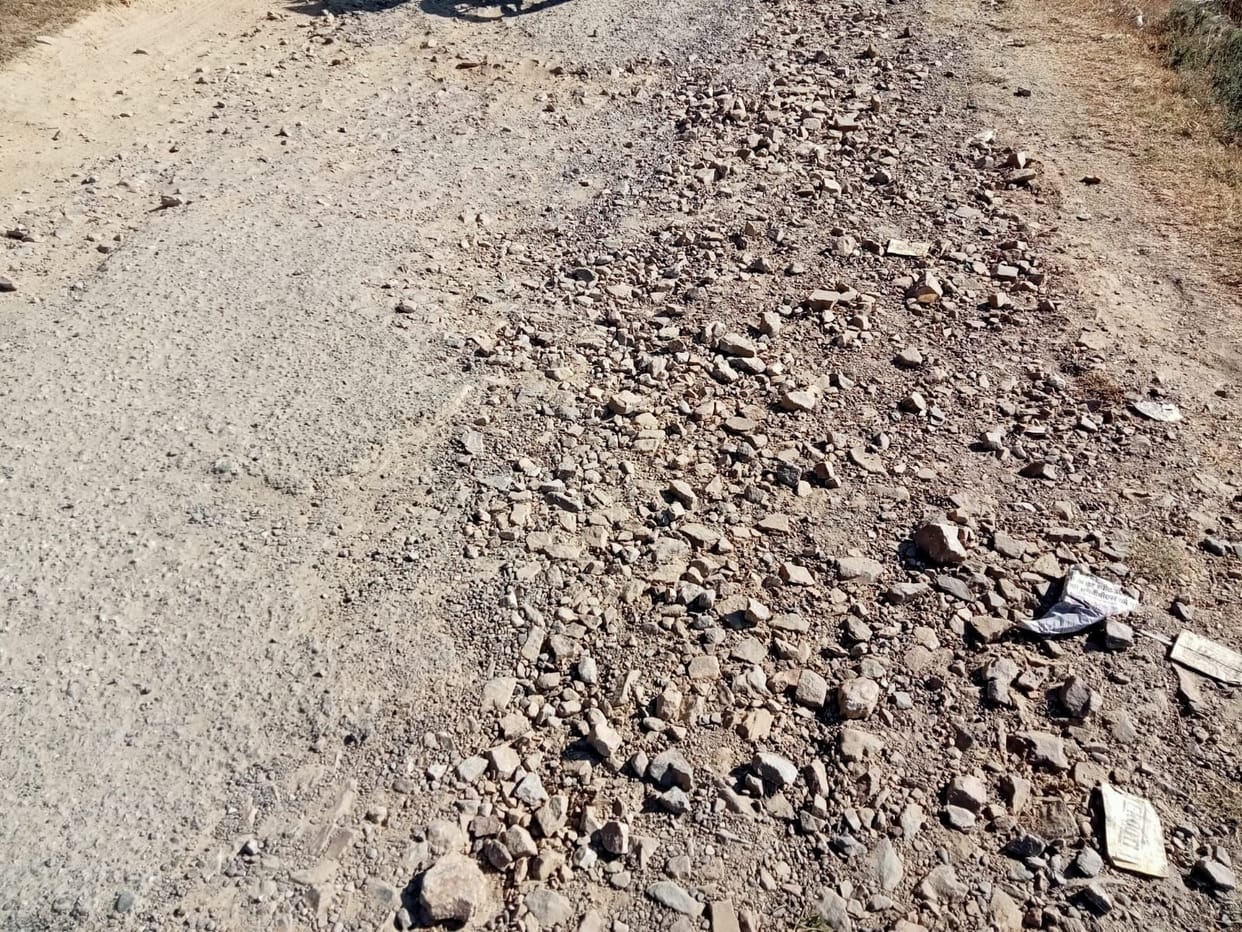 Potholes every five meters on Degree College-Devidhar road