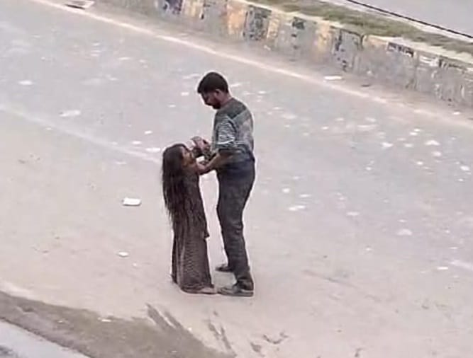 Daughter beaten on the road, video goes viral