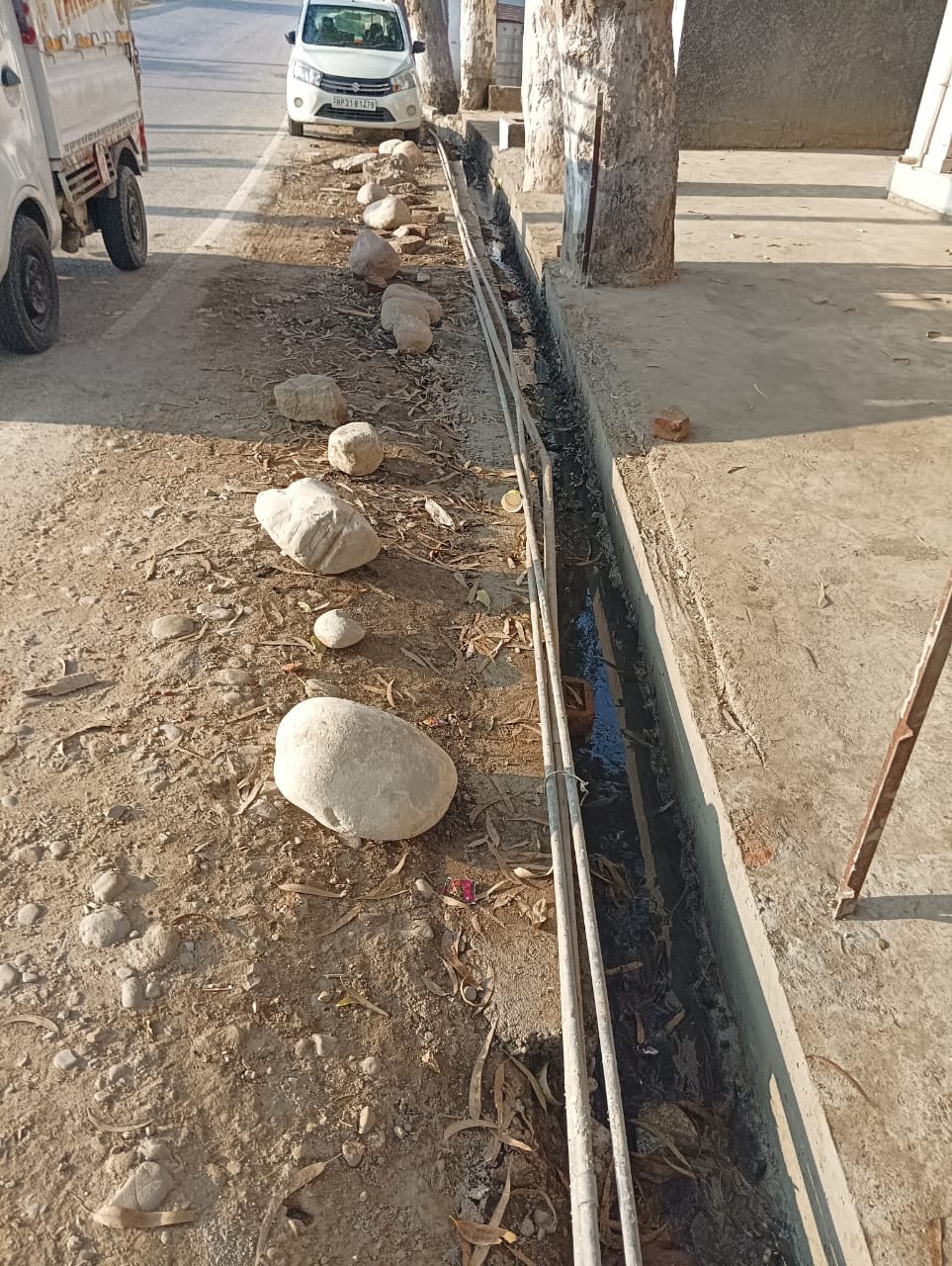 Department in action: Slab inserted along with drainage drain in Duggha School